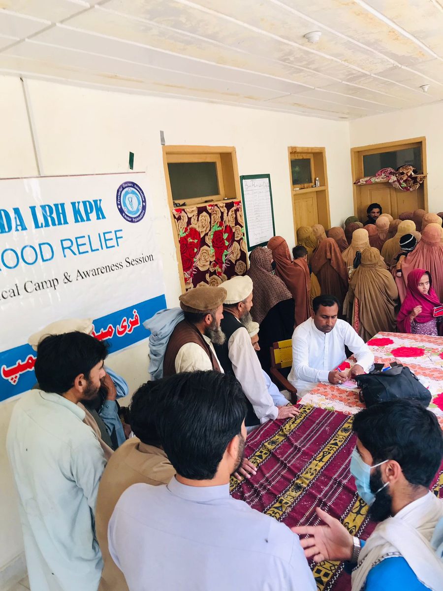 Community members gathered at a Sehat Sitara camp