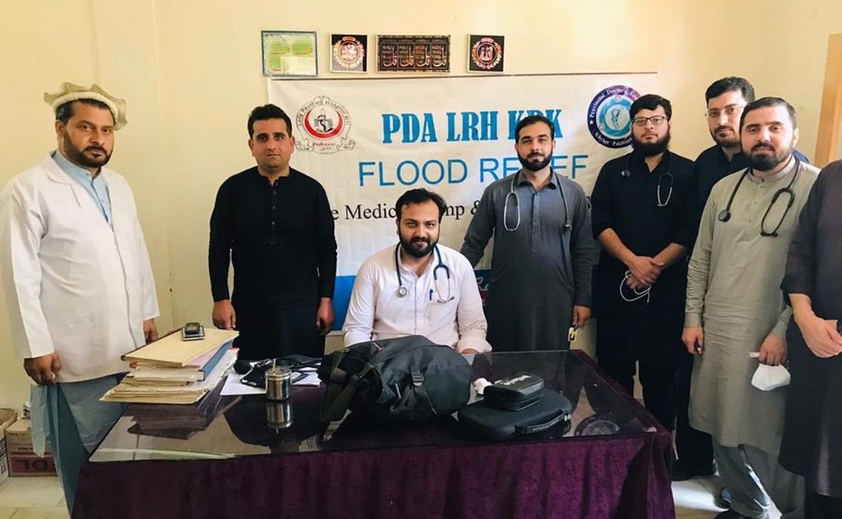 Sehat Sitaray volunteers preparing medicine and supplies before a camp